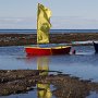<p align=left> À Sainte-Flavie, Gaspésie: année après année, la chaloupe rouge, fidèle, attend son maître.